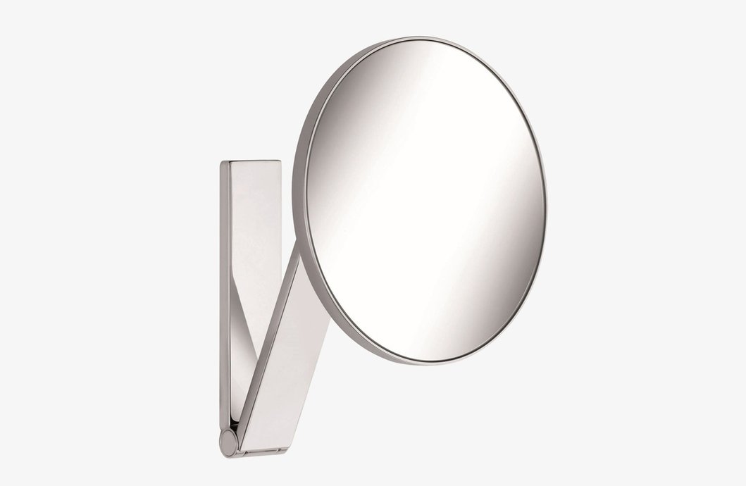Wall-mounted round magnifying mirror